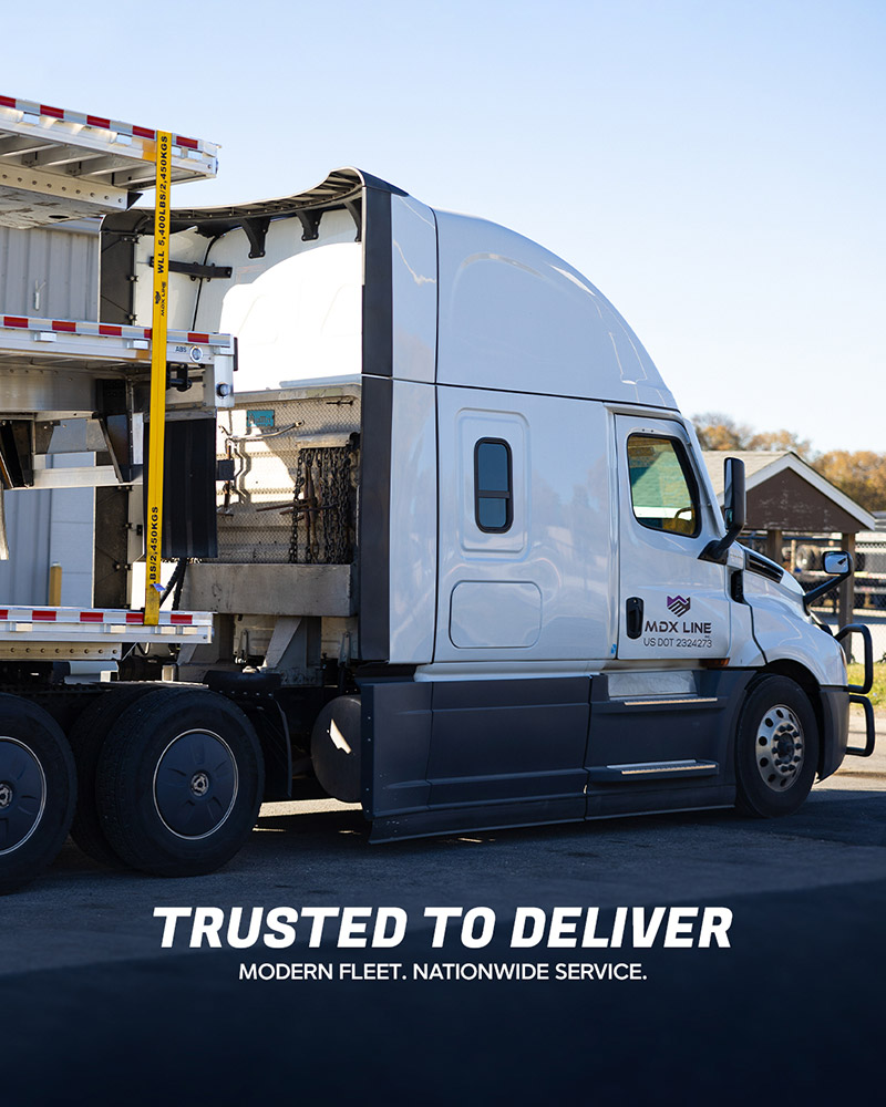 MDX Line Freightliner showing headache rack behind cab