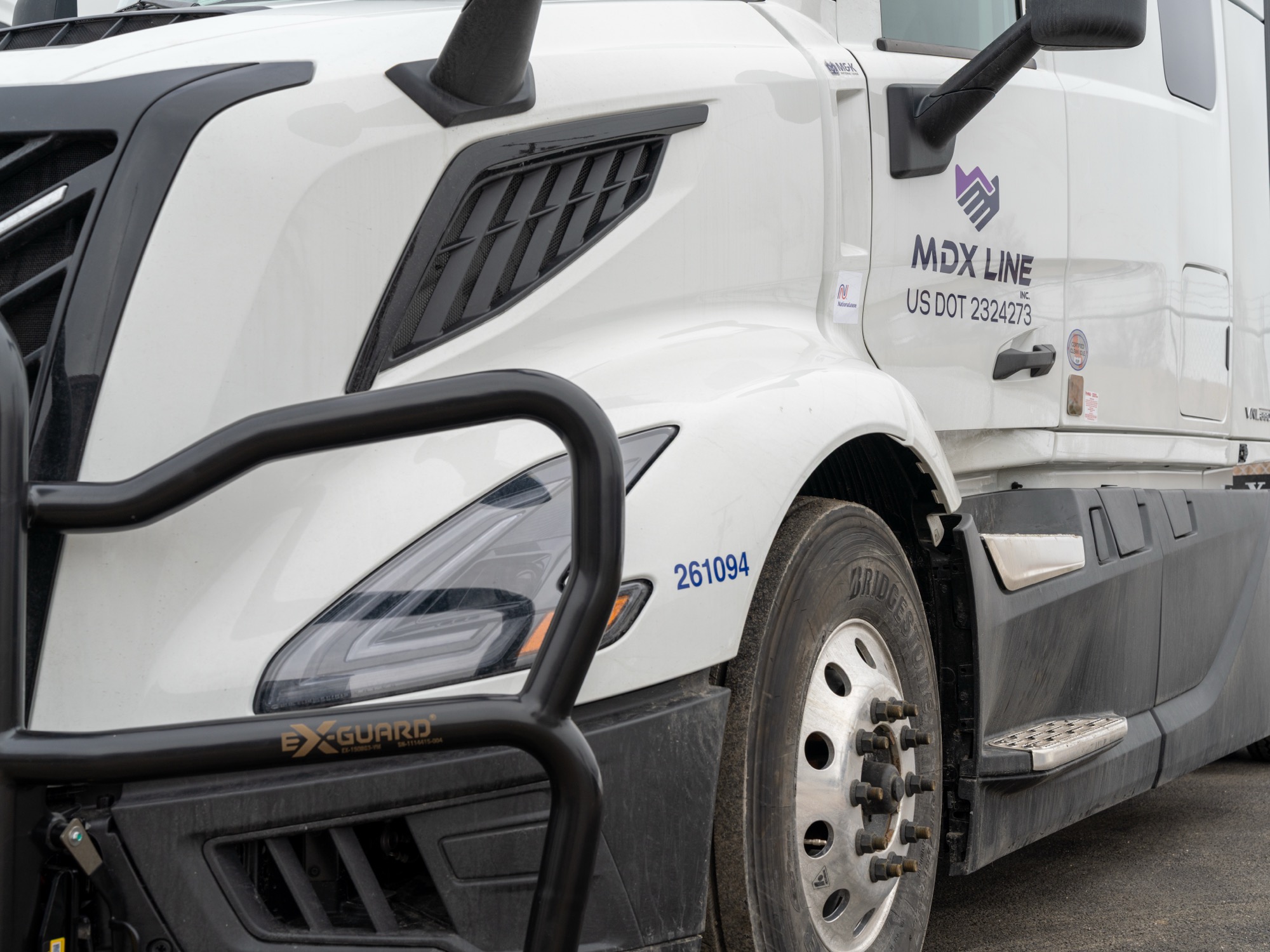 Close-up of MDX Line branded Volvo truck